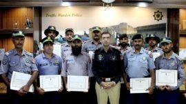 Conducting prize distribution ceremony at Traffic HQ Gulbaharٹریفک