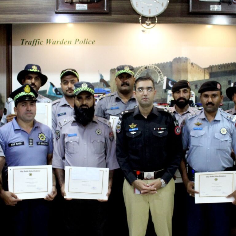 Conducting prize distribution ceremony at Traffic HQ Gulbaharٹریفک