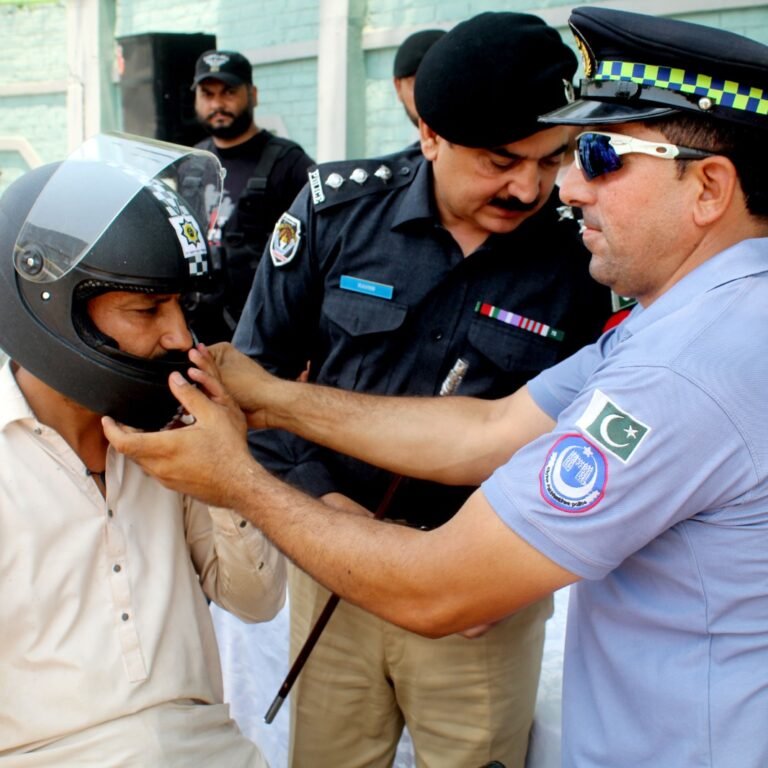 City Traffic Police Peshawar distributed helmets to motorcyclists