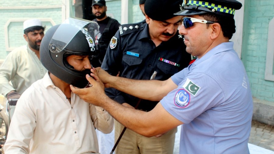 City Traffic Police Peshawar distributed helmets to motorcyclists