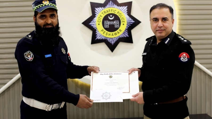 An awards distribution ceremony at the City Traffic Headquarters, Gulbahar.