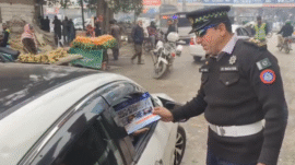 Peshawar City Traffic Police continue their awareness campaign on traffic laws.